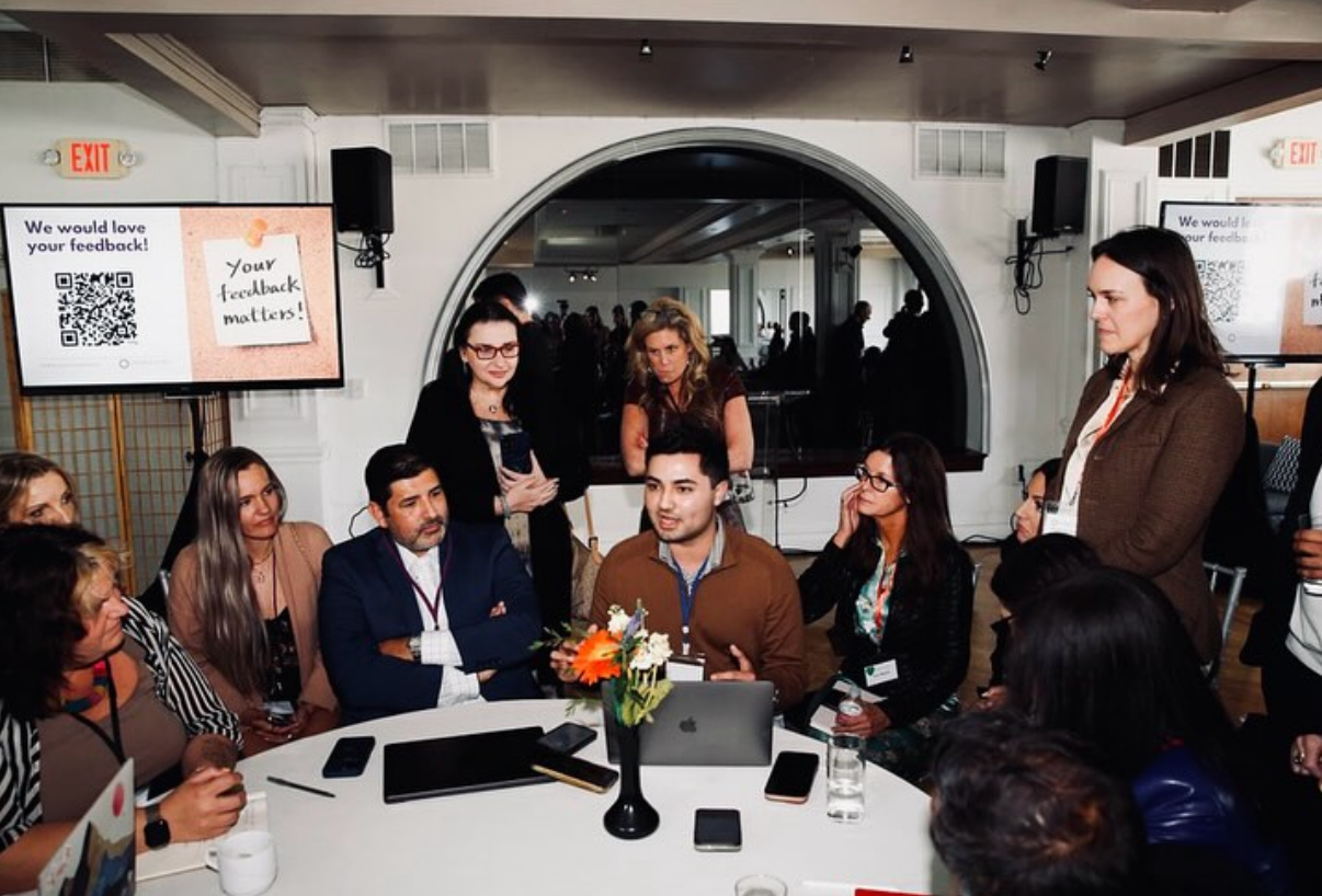 Nate Romero presenting at the 2025 Global Love Conference